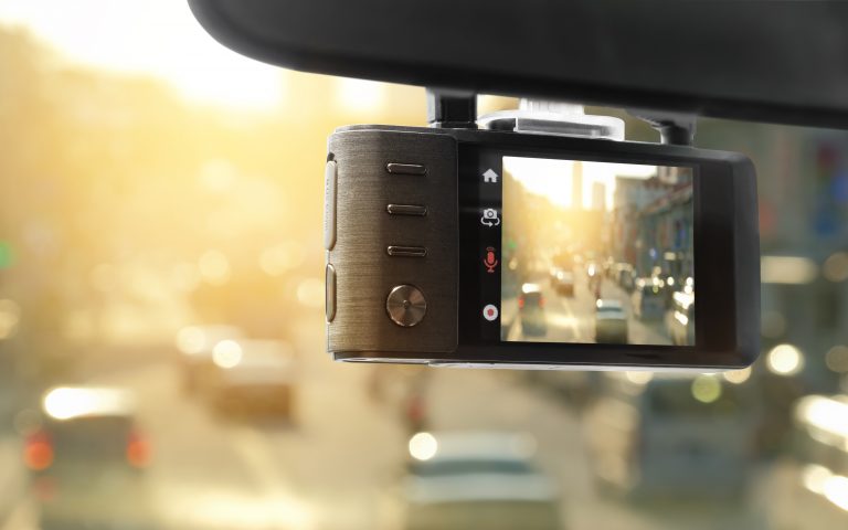 Commercial construction and service fleet vehicle using a forward-facing dash camera for safety and fleet visibility